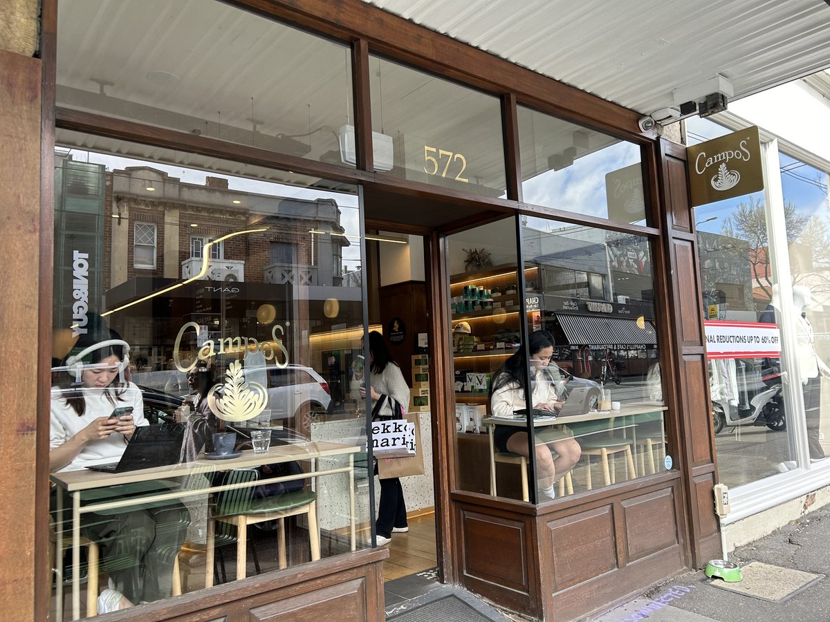 Campos storefront on Chapel Street with gold lettering