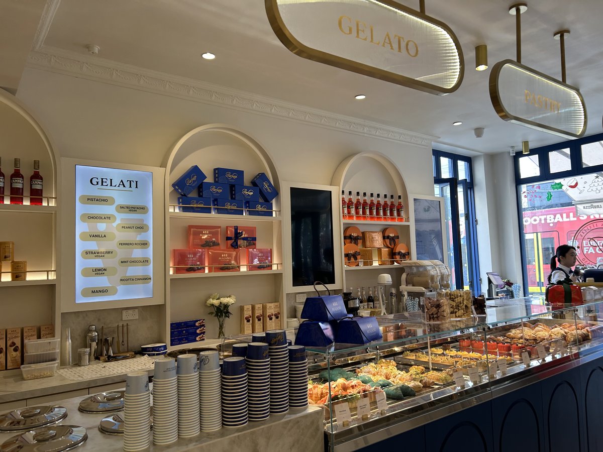Pierluigi gelato and pastry counter with gold signage
