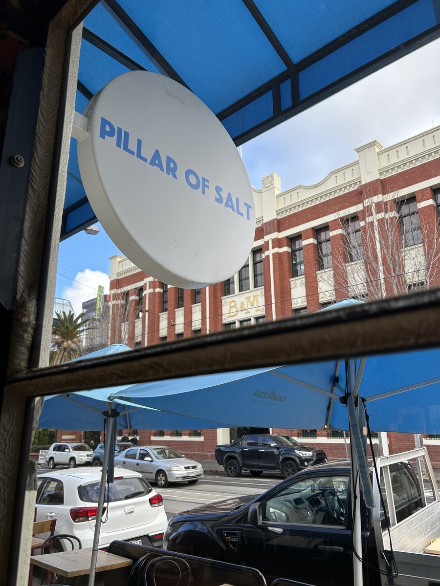 Pillar of Salt round sign hanging outside on Church Street